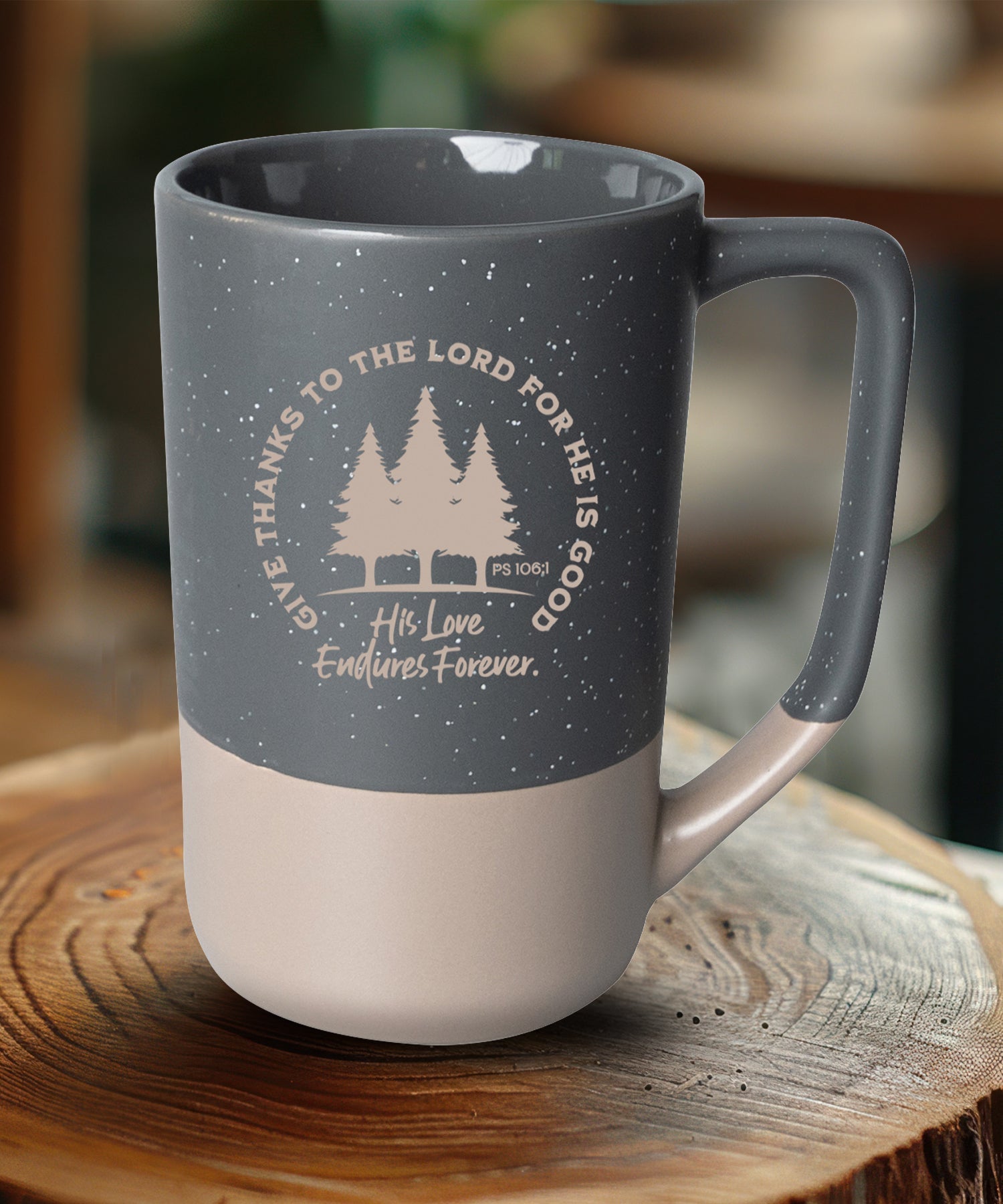 Two-toned ceramic mug with pebble accents featuring Give Thanks to the Lord and a corresponding image.