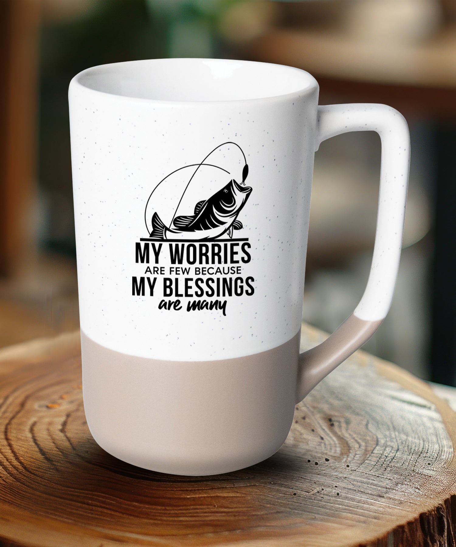 Two-toned ceramic mug with pebble accents featuring My Worries Are Few and a corresponding image.
