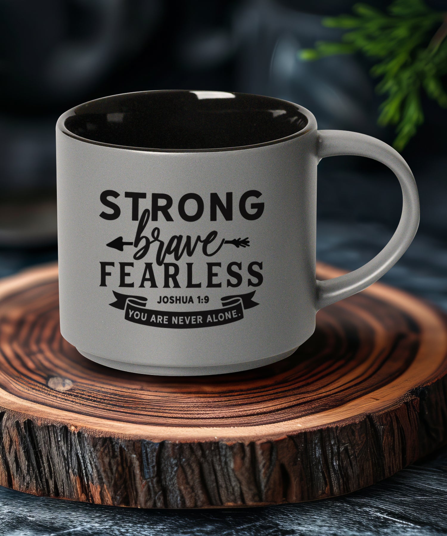 Gray stacking mug with black interior, featuring Strong Brave Fearless.