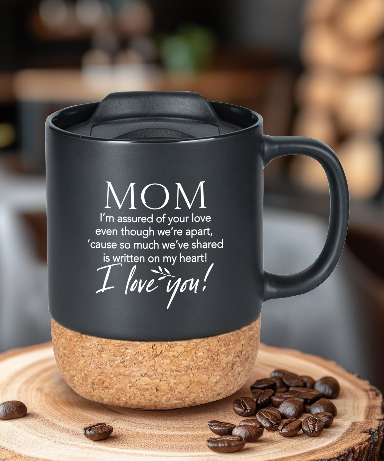 Cork bottom mug with a push-on, slide-locking lid featuring Mom I’m Assured.