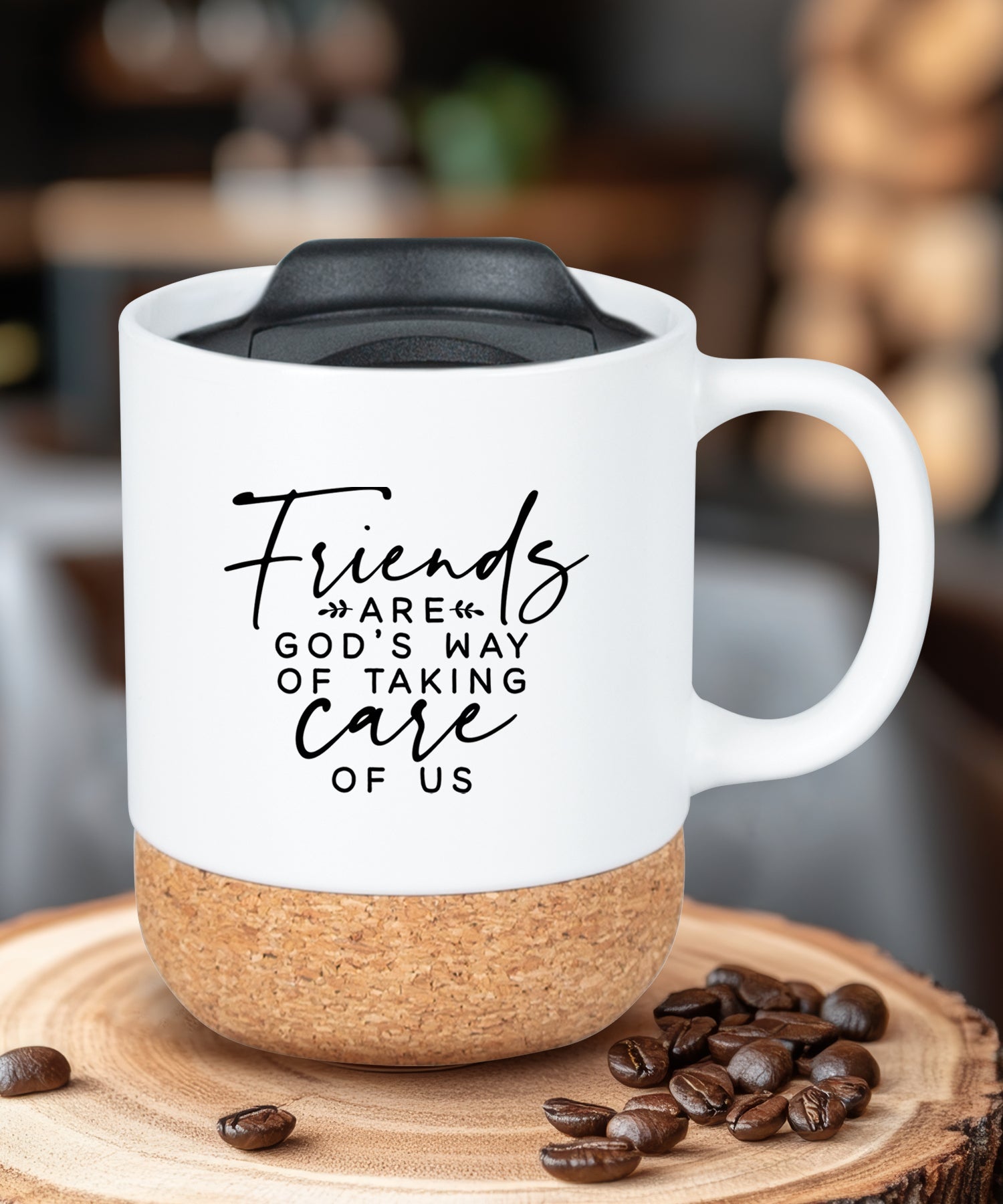 Cork bottom mug with a push-on, slide-locking lid featuring Friends Are God’s Way.
