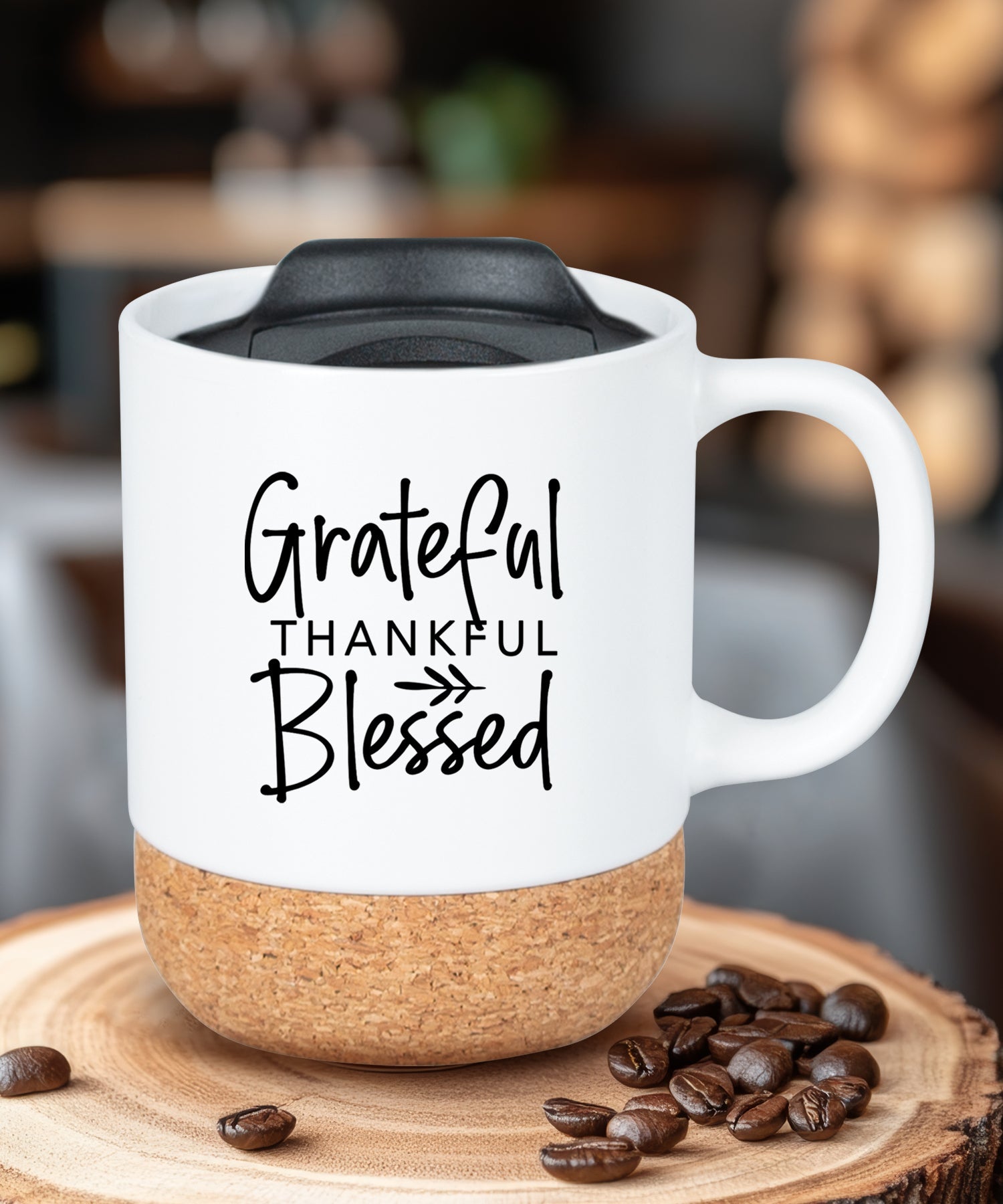 Cork bottom mug with a push-on, slide-locking lid featuring Grateful Thankful Blessed.