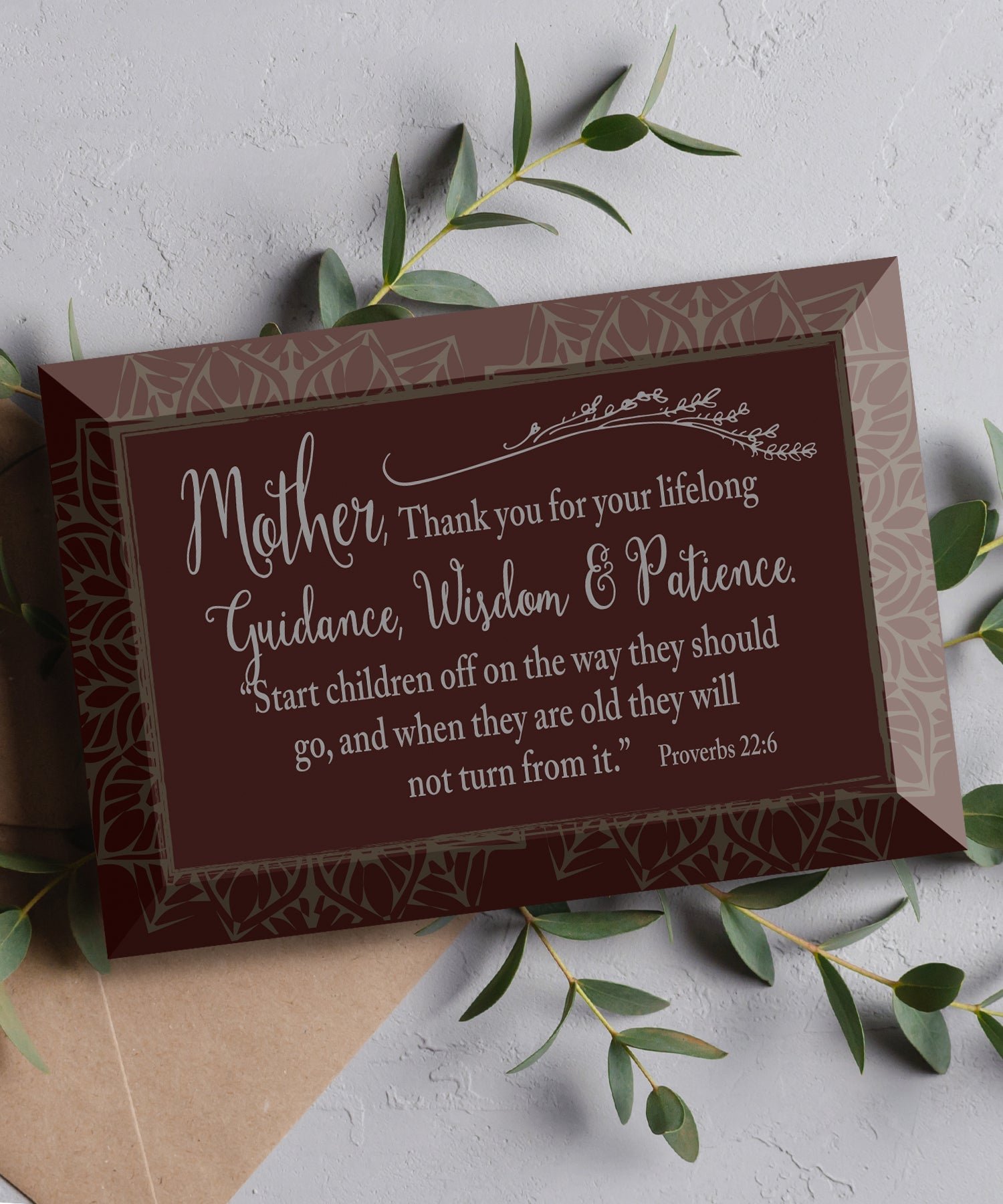 Mother Thank You Glass Plaque, which has smooth beveled edges and a screen-printed design, is perfect for display on a shelf.