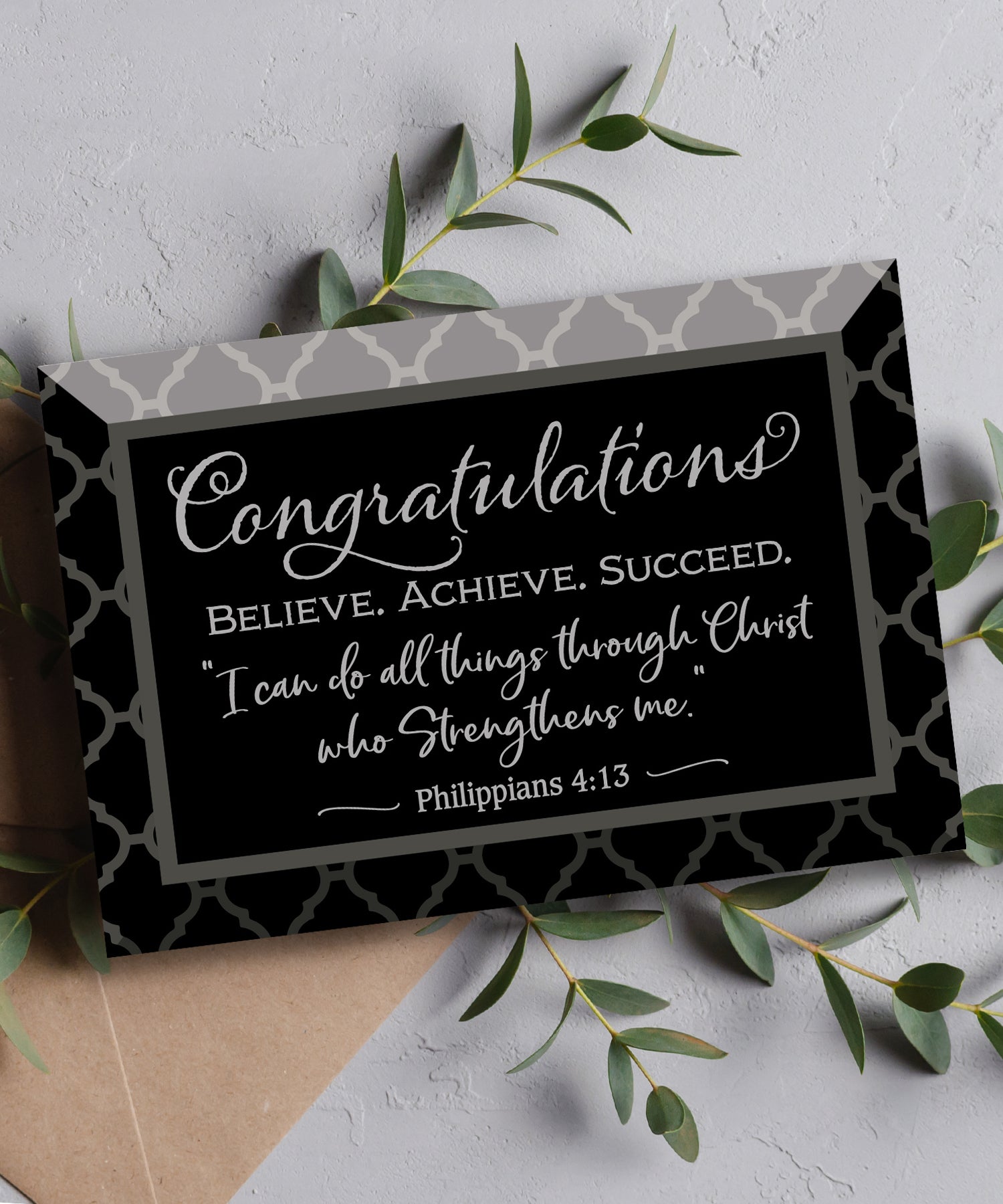 Congratulations Glass Plaque, which has smooth beveled edges and a screen-printed design, is perfect for display on a shelf.