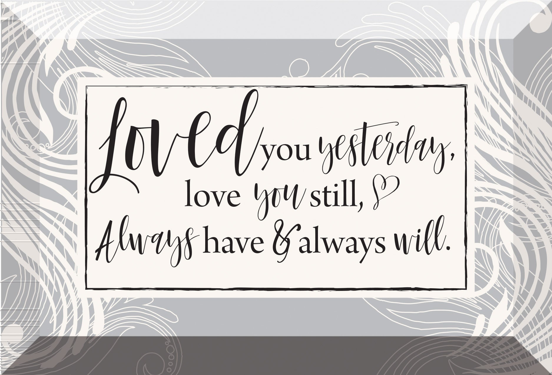 Loved You Yesterday Glass Plaque, which has smooth beveled edges and a screen-printed design, is perfect for display on a shelf.