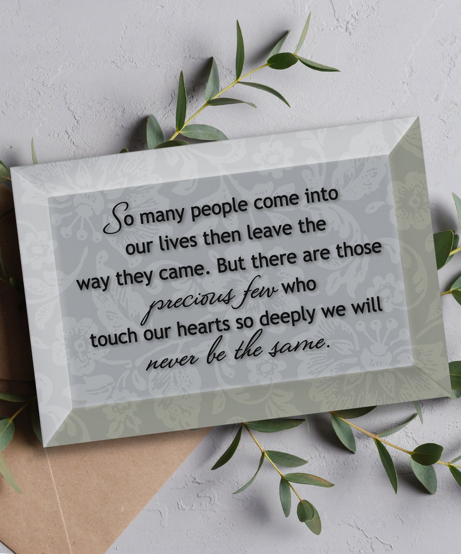 So Many People Glass Plaque, which has smooth beveled edges and a screen-printed design, is perfect for display on a shelf.