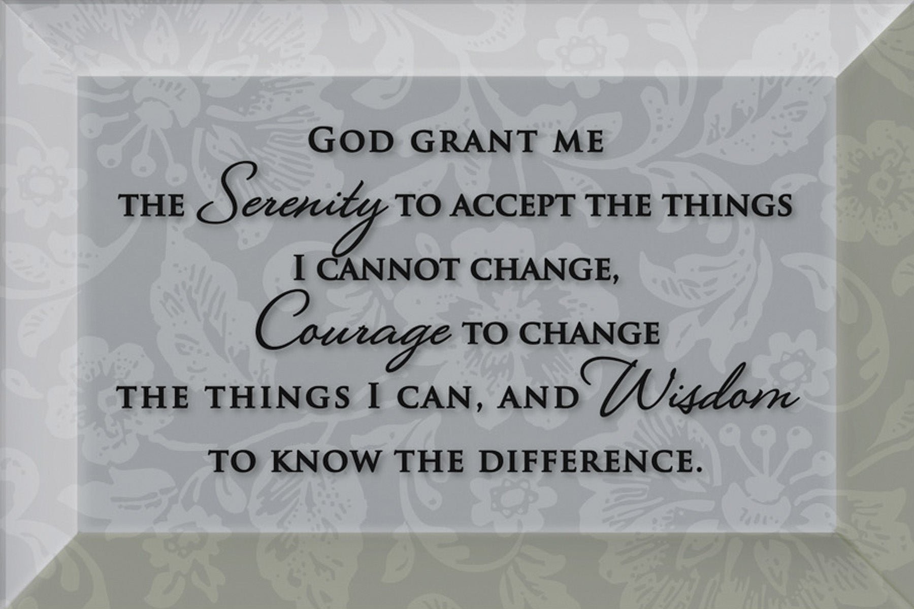 Serenity Prayer Glass Plaque, which has smooth beveled edges and a screen-printed design, is perfect for display on a shelf.