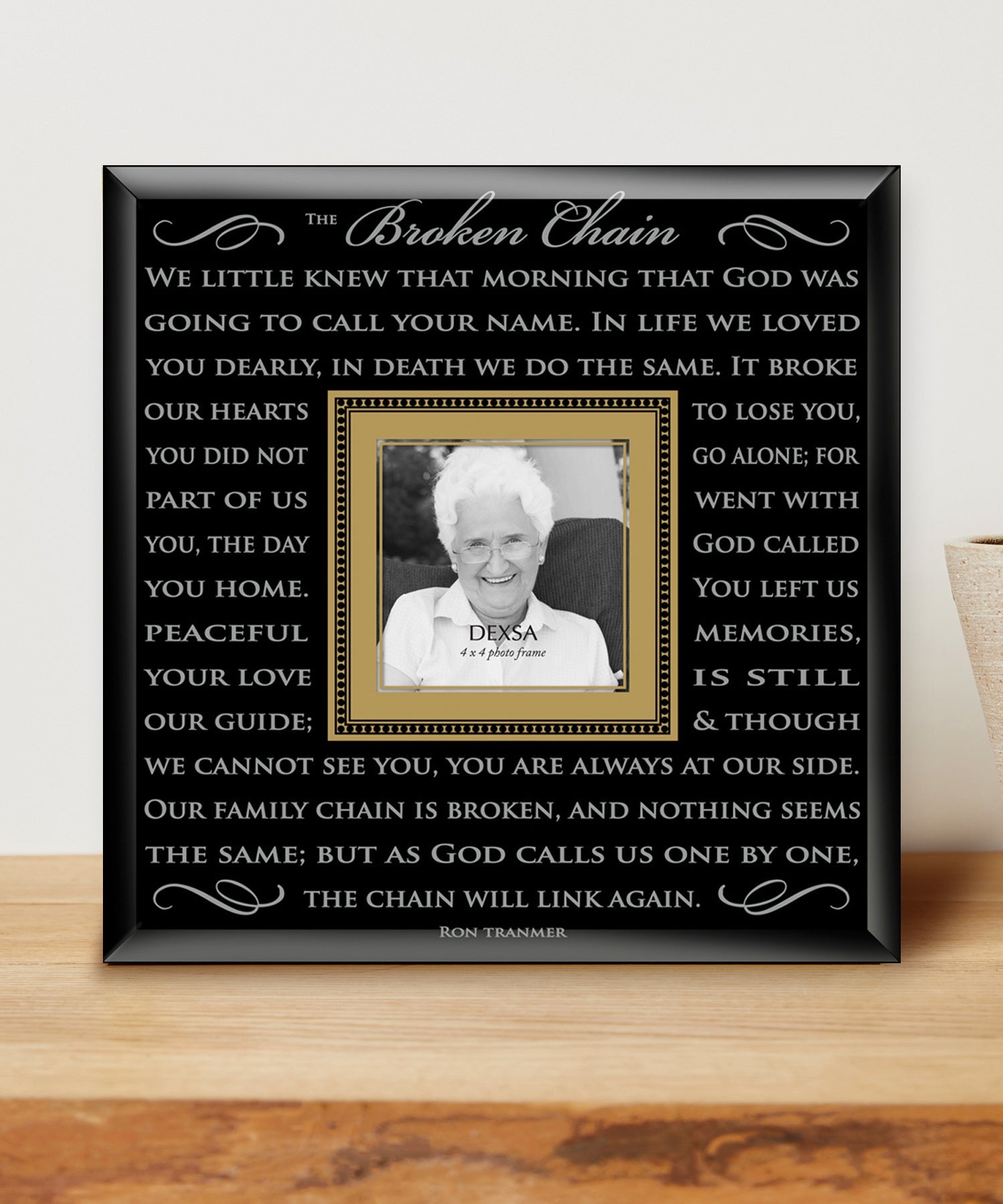 Broken Chain Glass Photo Frame with smooth beveled edges, holding a 4x4 photo, displayed on a shelf.