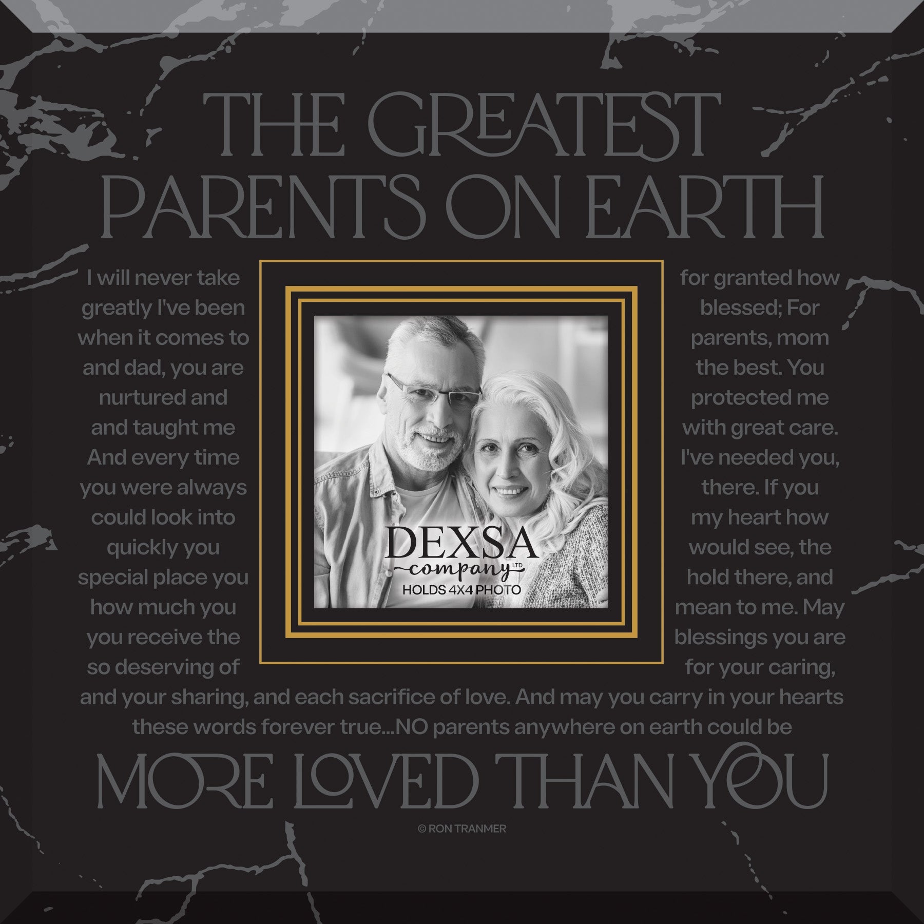 The Greatest Parents on Earth 12x12 Glass Photo Frame with smooth beveled edges, holding a 4x4 photo, displayed on a shelf.