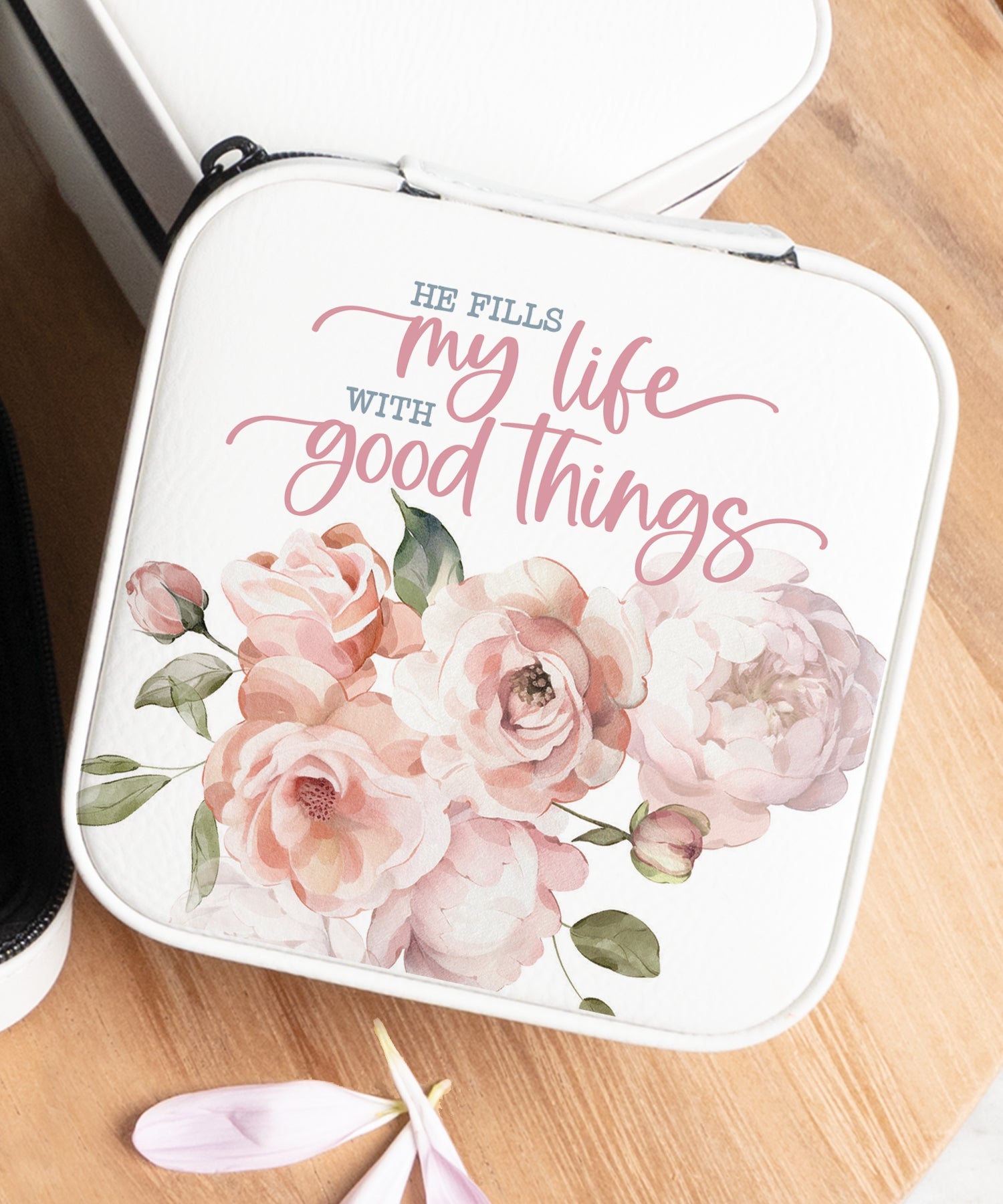 He Fills My Life Travel Jewelry Case in off-white leatherette with a zipper closure and plush black velvet interior.