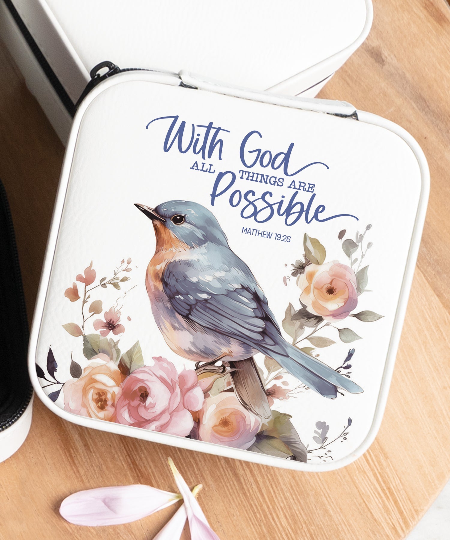 With God Travel Jewelry Case in off-white leatherette with a zipper closure and plush black velvet interior.