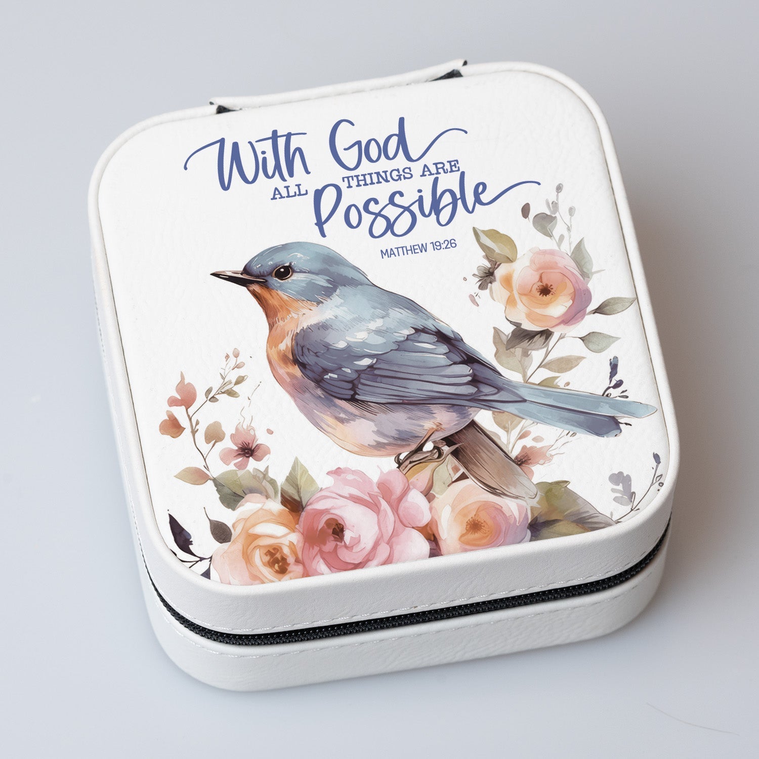 With God Travel Jewelry Case in off-white leatherette with a zipper closure and plush black velvet interior.