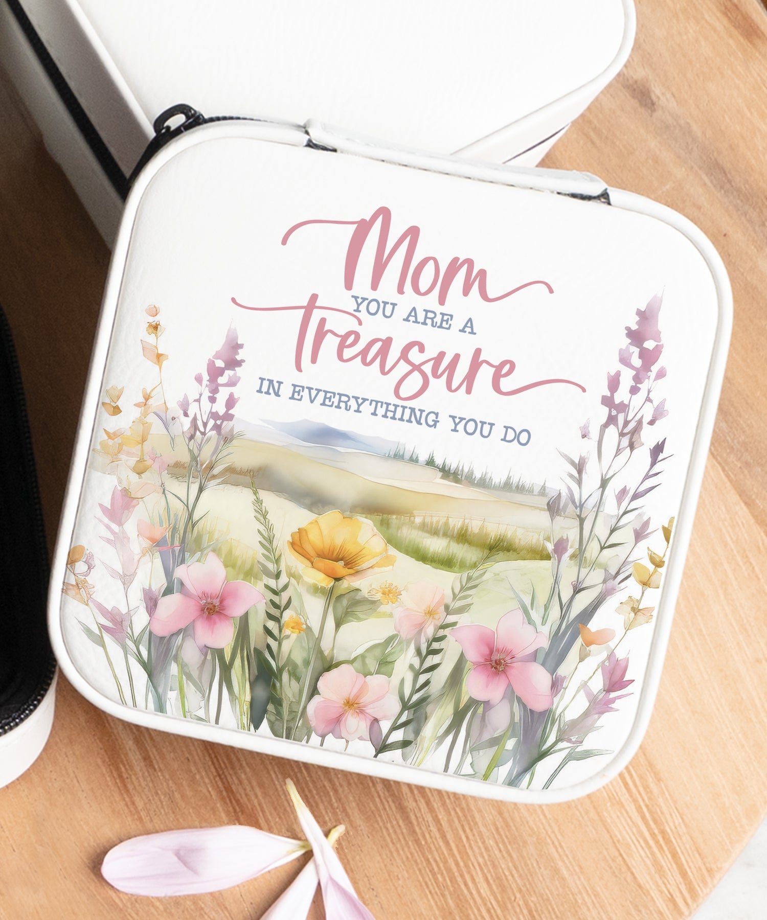 Mom You Are a Treasure Travel Jewelry Case in off-white leatherette with a zipper closure and plush black velvet interior.