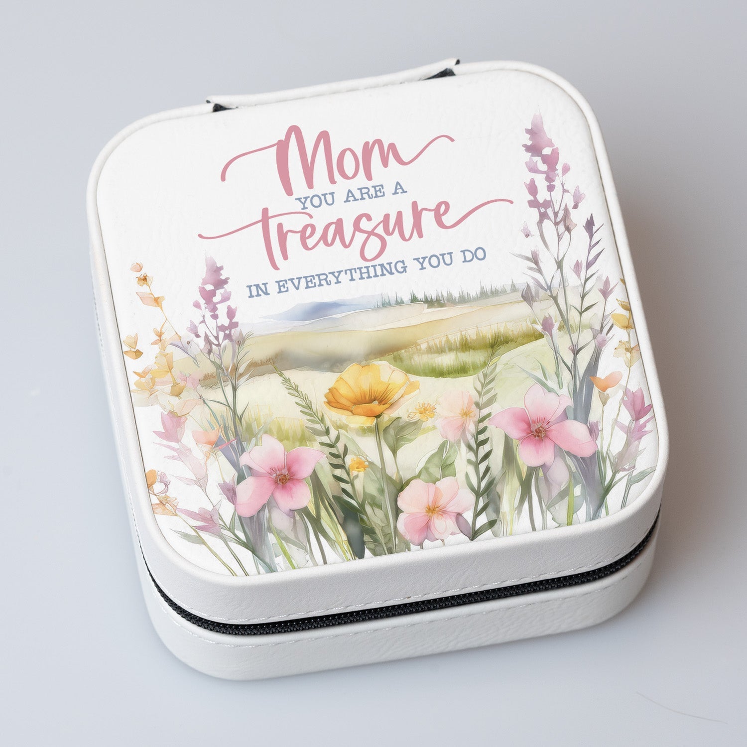 Mom You Are a Treasure Travel Jewelry Case in off-white leatherette with a zipper closure and plush black velvet interior.