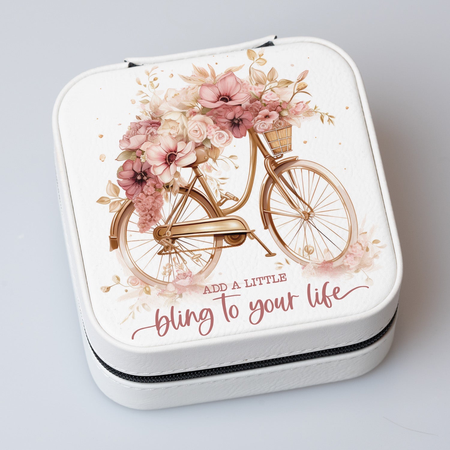 Add a Little Bling Travel Jewelry Case in off-white leatherette with a zipper closure and plush black velvet interior.