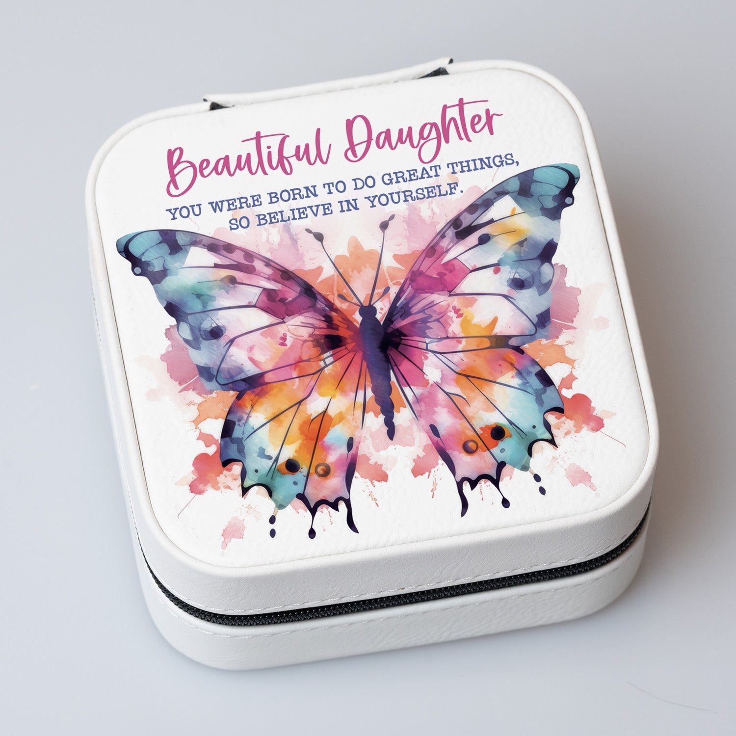 Beautiful Daughter Travel Jewelry Case in off-white leatherette with a zipper closure and plush black velvet interior.