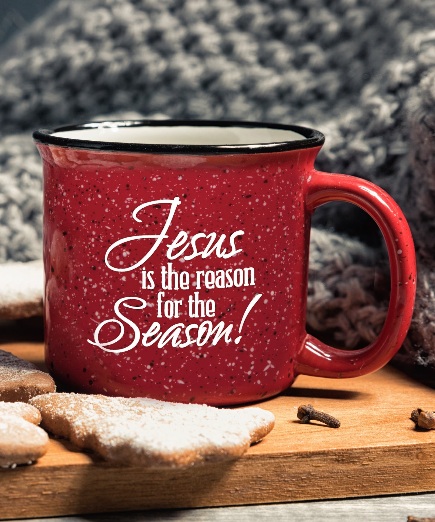 Ceramic Christmas camping mug with a design resembling a classic tin cup featuring the message Jesus Is the Reason.