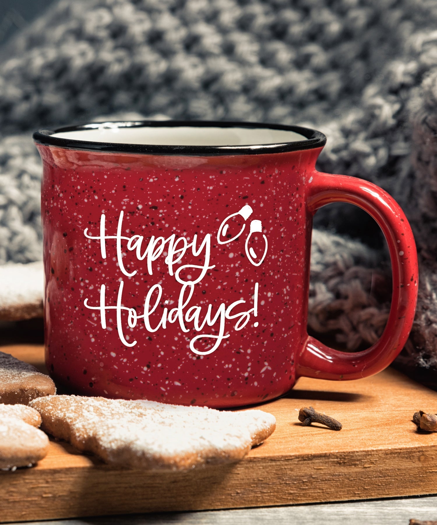 Ceramic Christmas camping mug with a design resembling a classic tin cup featuring the message Happy Holidays.