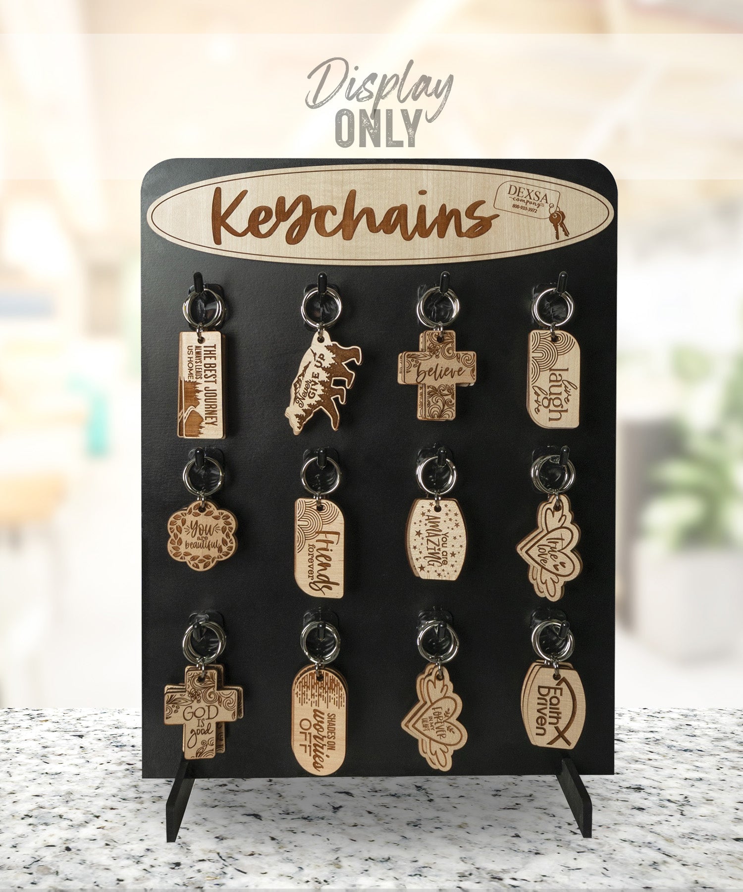 Single-sided MDF counter display with attached wood header, designed to hold Dexsa keychains, compact and easy to assemble.